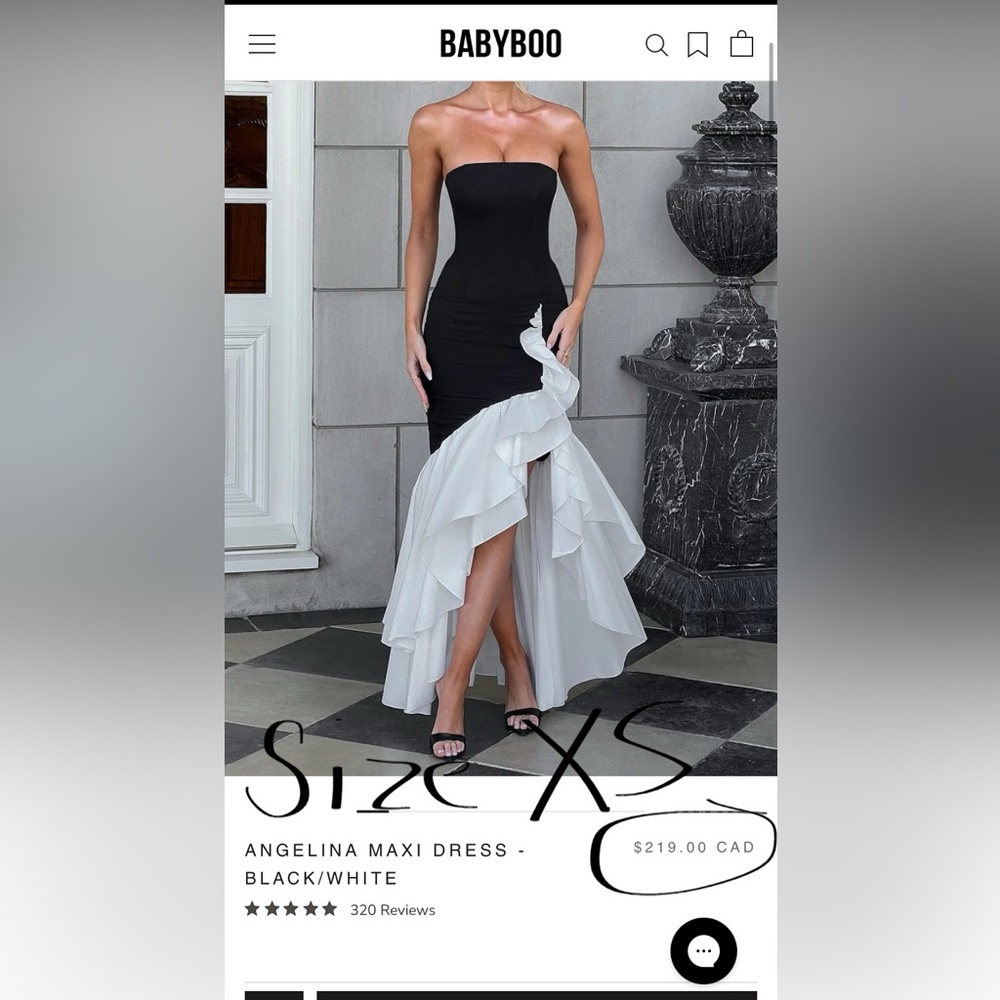 Chic Black and White High low dress
Never worn.